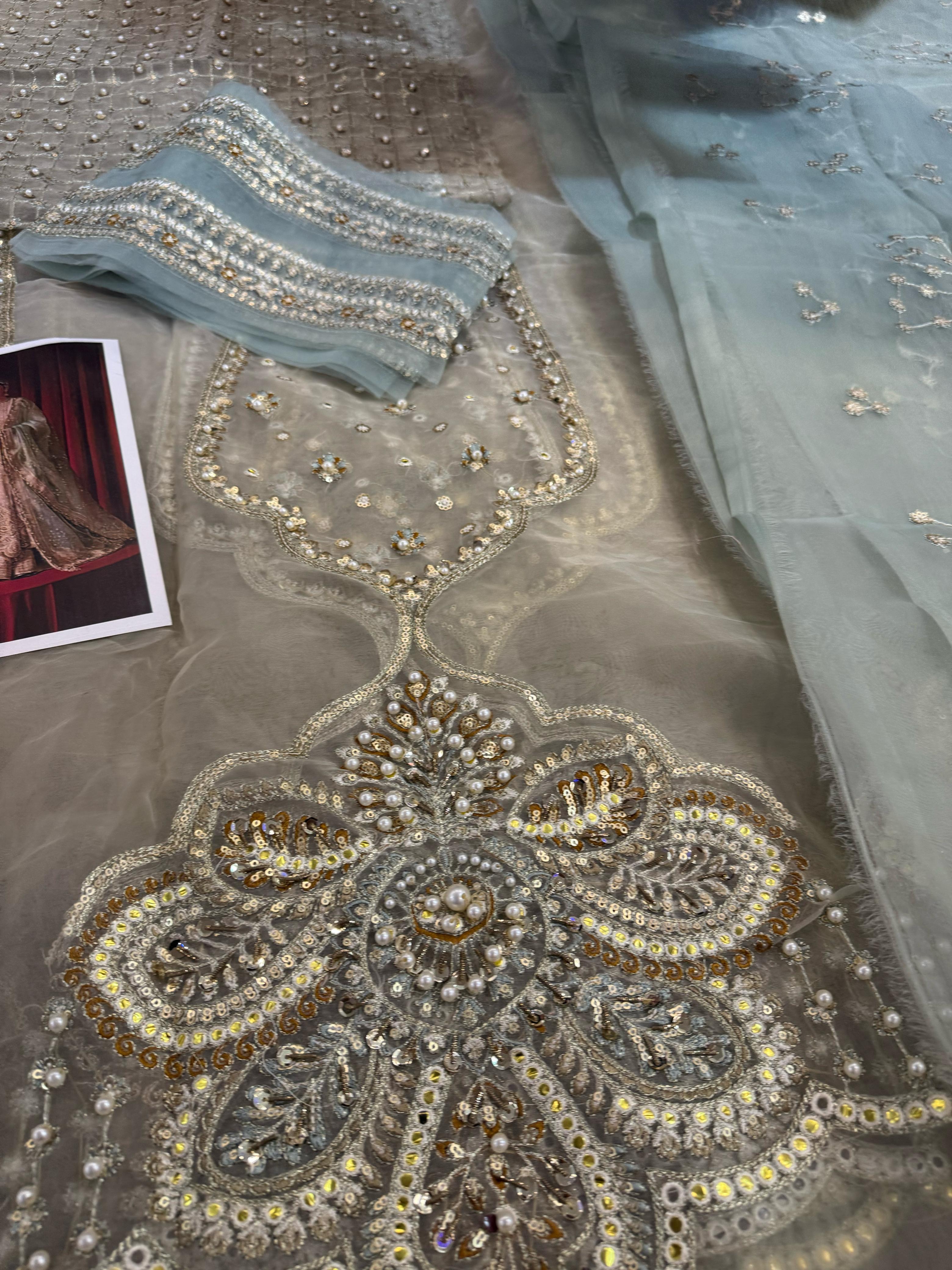 Mohsin Naveed Ranjha Luxe Bridal Collection – Majestic Ivory & Gold Handcrafted Masterpiece