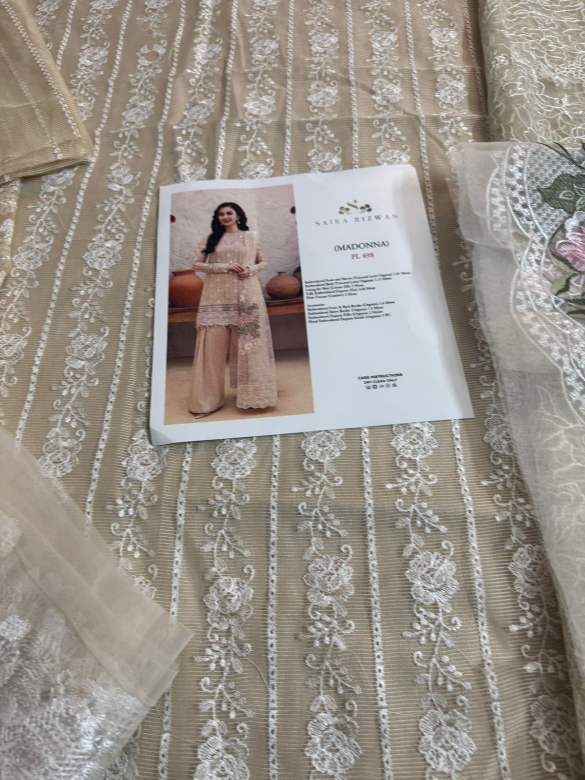 Saira Rizwan Luxury Lawn 2025 | Madonna Elegance in Soft Beige Embroidery