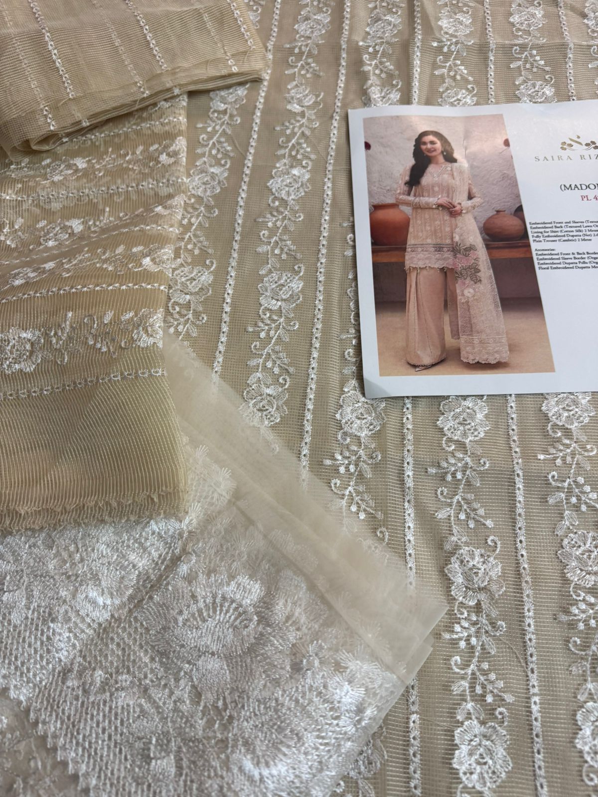 Saira Rizwan Luxury Lawn 2025 | Madonna Elegance in Soft Beige Embroidery