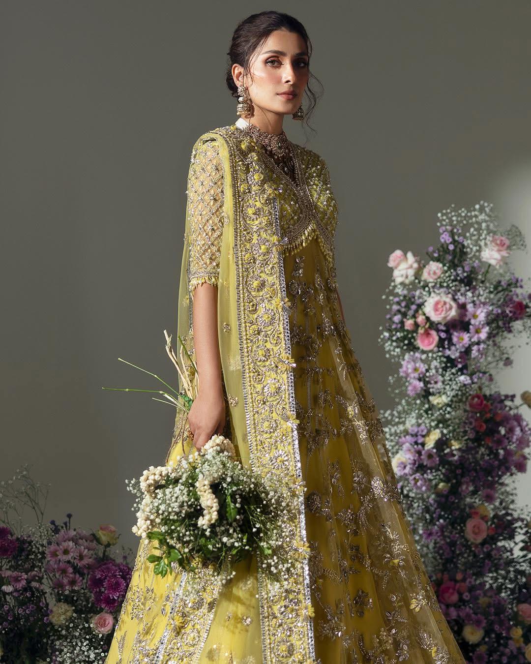 Radiate Grace in Élan's Mesmerizing Light Yellow Wedding Masterpiece